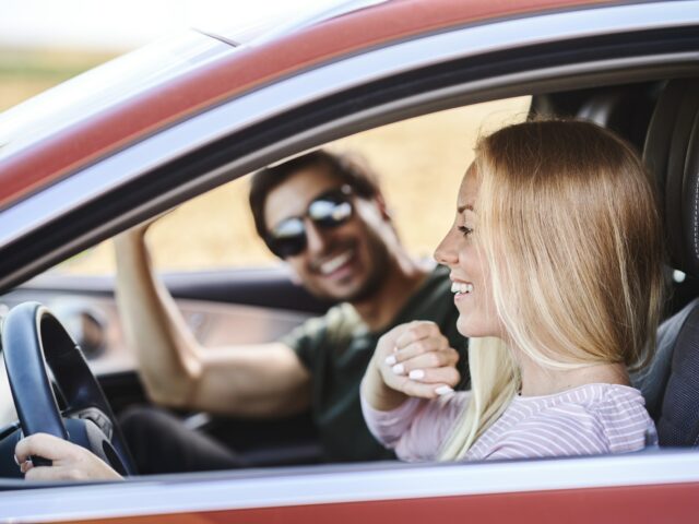 Couple driving in the car